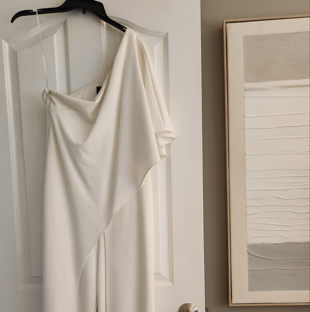 Elegant White One-Shoulder jumpsuit.